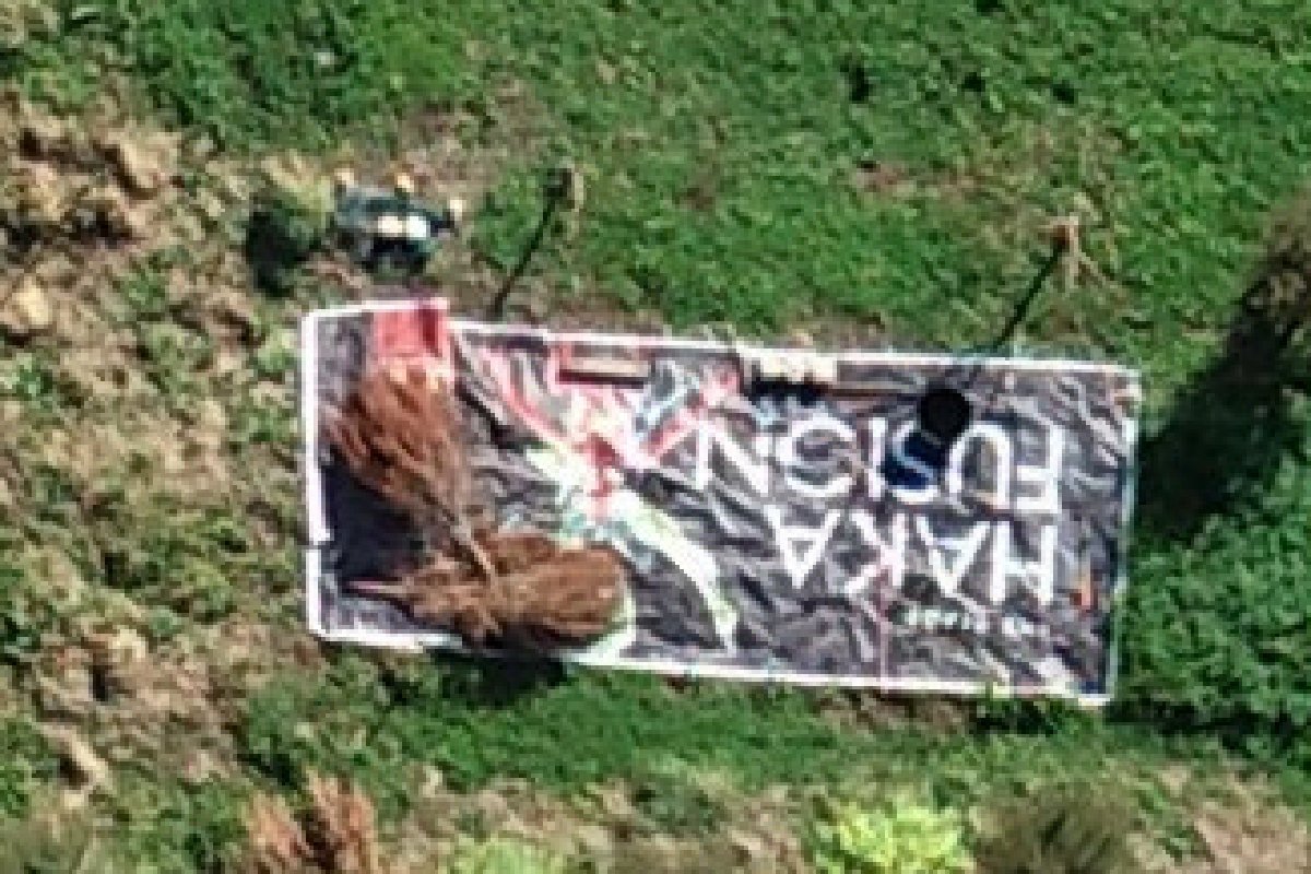 The banner photographed from 120 m